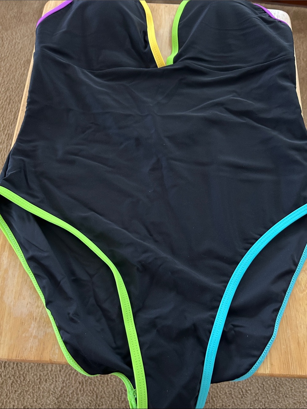 Black One-Piece Swimsuit with Neon Green, Teal & Purple Trim